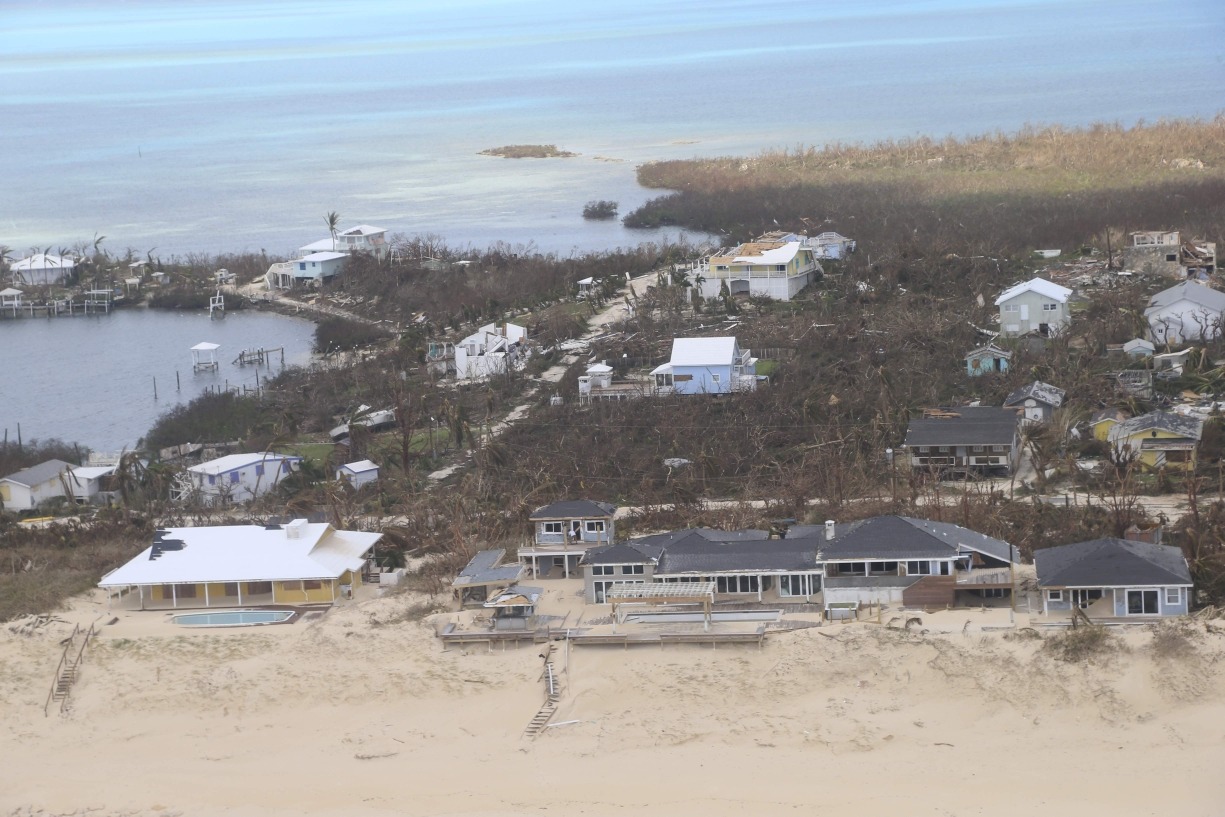 An aerial view of the residence and surrounding coastline after the storm.