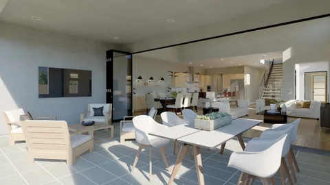 A home opening to a patio through a connected door-and-window system.