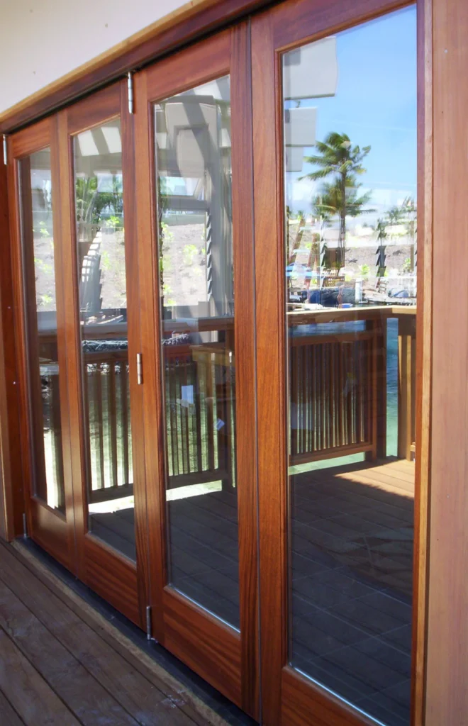 Resort installation of a folding wood door.