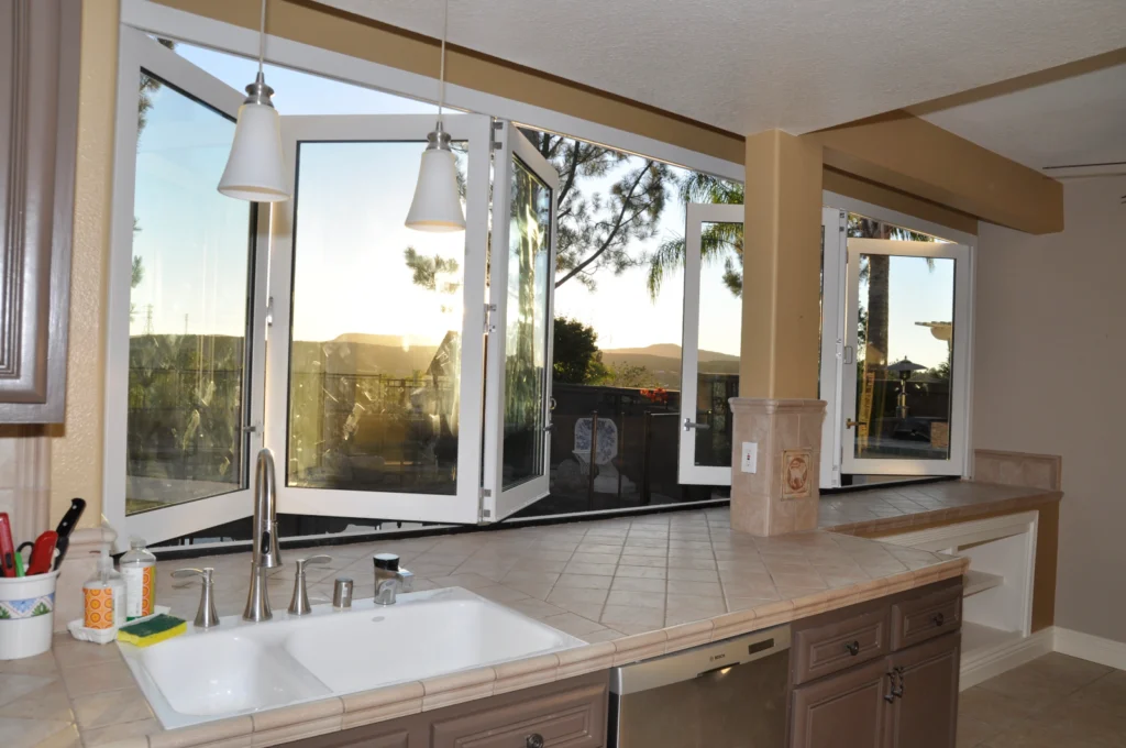 Durable aluminum folding window system designed for long-lasting residential indoor-outdoor living.
